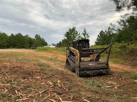 land clearing with a skid steer